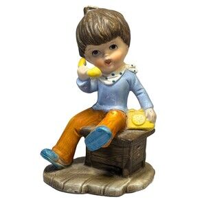 Vintage Japan Ceramic Figurine – Child Talking on Yellow Rotary Phone –